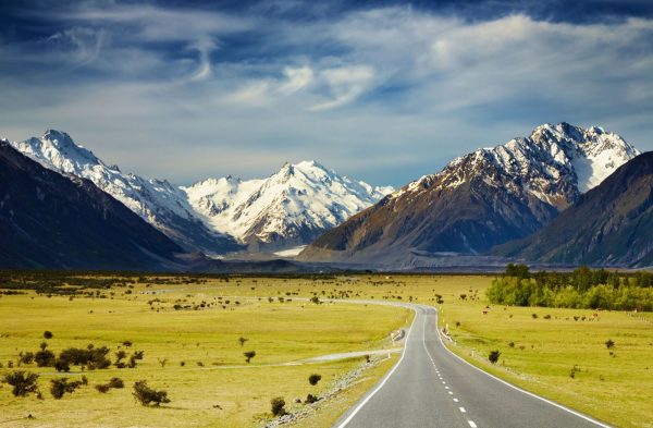 Visit-New-Zealand-Landscape-With-Road-and-Snowy-Mountains-Southern-Alps-New-Zealand-1600×1047